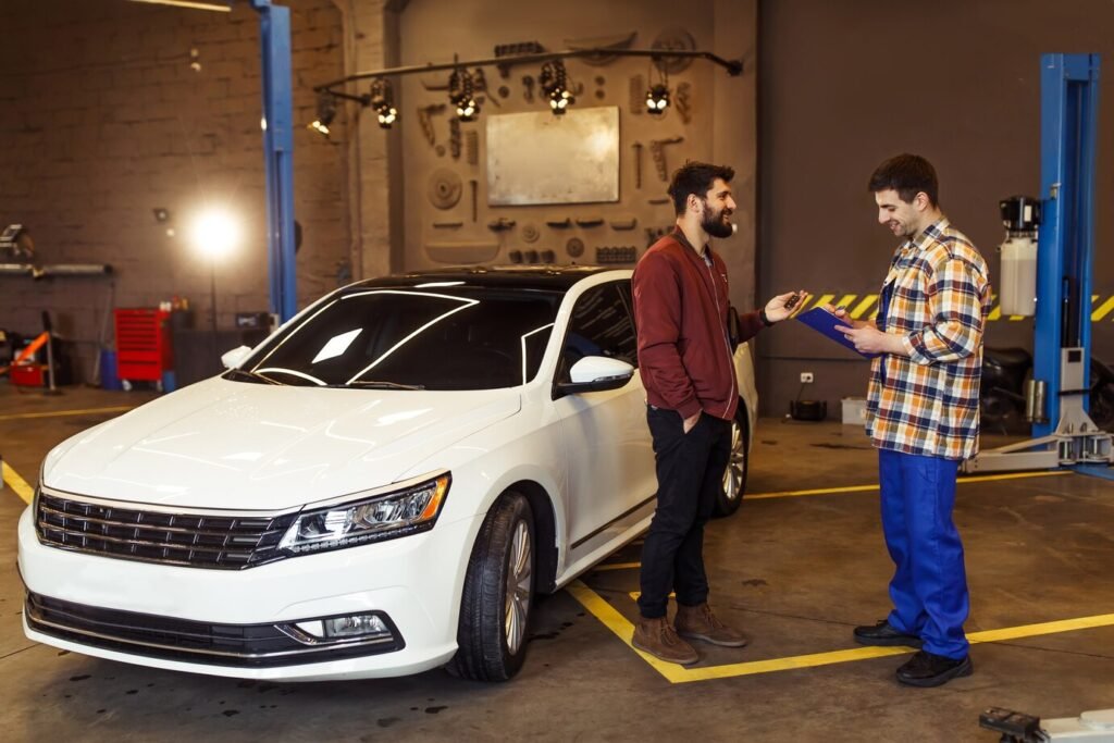 male-customer-auto-service-center-explaning-problems-his-car-mechanic-with-clipboard_496169-1047-1024x683 The Benefits of a Free Vacuum Car Wash Program: Keeping 0ur Community Clean