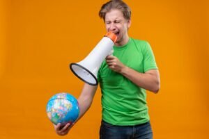 upset-young-handsome-man-wearing-green-t-shirt-holding-globe-shouting-megaphone-standing-orange-wall_141793-22812-300x200 Home